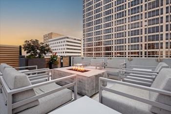 Rooftop lounge seating at sky on main